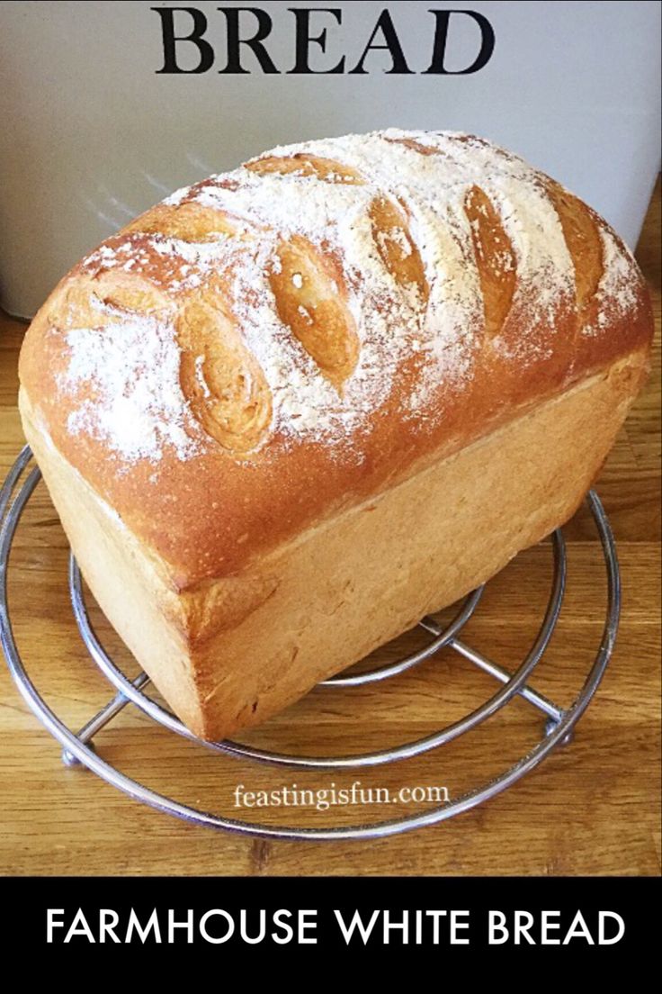 A flour dusted, freshly baked loaf of white bread on a cooling rack, with descriptive graphics. Pheasant Bread Recipe, Best Brioche Bread Recipe, Uk Bread Recipes, White Bread Loaf Recipe, English Bread Recipes, British Bread Recipes, Farmers Bread, Best Bread, Flavoured Bread