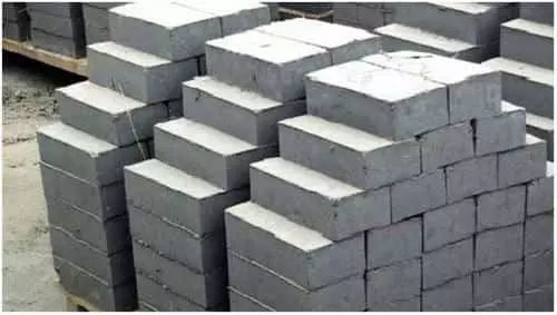 several stacks of cement blocks stacked on top of each other