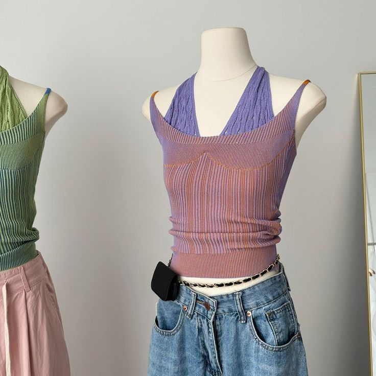 These double-layered Y2K knit halter tops, one in lavender and the other in sage green, are essential for crafting that nostalgic Y2K outfit. Their vibrant colors and distinctive design make for a perfect throwback style statement Free Size:Bust: 60cm/ 23.6 in, Length: 25cm/ 18.5 inMaterial: Polyester Y2k Ribbed Tops For Spring, Y2k Halter Neck Top For Spring, Y2k Style Halter Neck Tops For Spring, Spring Y2k Halter Neck Top, Trendy Purple Knit Tops, Purple Knit Tops For Layering, Purple Y2k Tank Top For Spring, Purple Ribbed Tops For Summer, Purple Ribbed Summer Tops