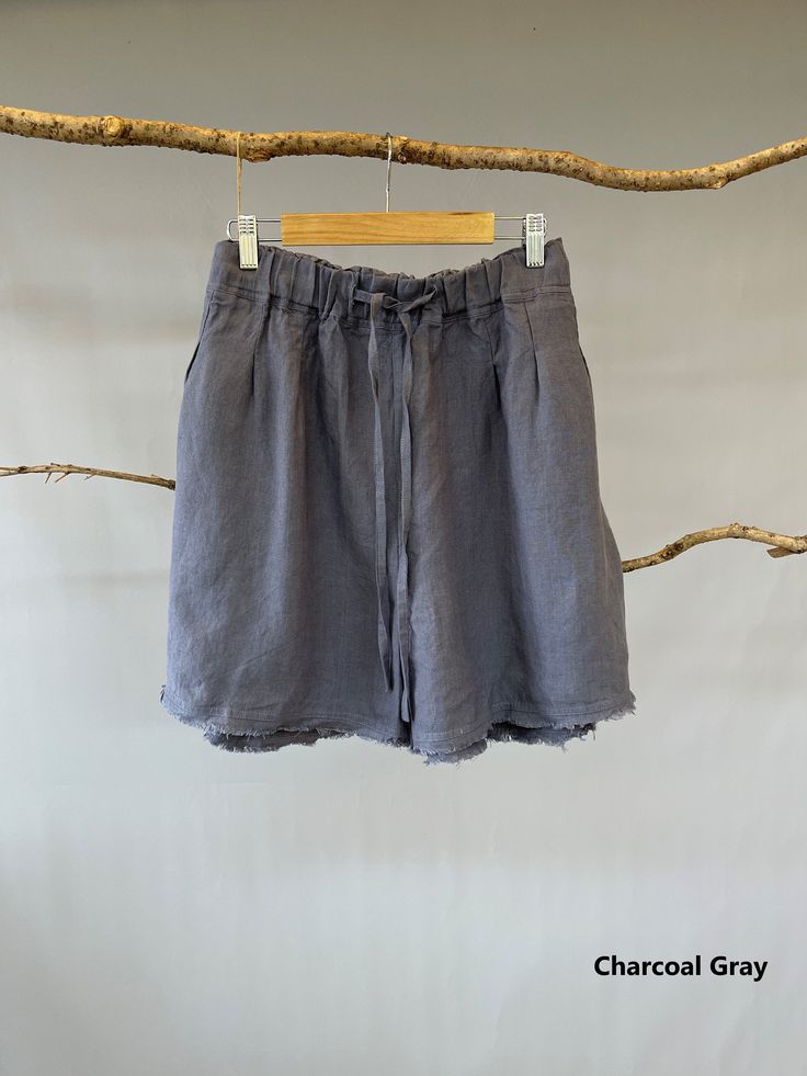 "Stunning colors, relaxed fit, and breathable pure linen fabric, are all you need for a pair of shorts in hot summer days, and even edgier look with the unfinished hem. - 100% Linen - High rise - Elastic band with drawstring to tie up - 2 side pockets - Unfinished hem details - Listing colors: Taupe, Cloudy Sky, Bright Yellow, White, and Black. - Matching top available: https://www.etsy.com/listing/962043184/loose-linen-tank-top-causal-linen-tank?ref=shop_home_active_4&frs=1&crt=1 Please Linen Bottoms With Built-in Shorts For Vacation, Linen Bermuda Shorts With Built-in Shorts And Relaxed Fit, Linen Beach Bottoms Short Length, Linen Shorts For Beach, Linen Beach Bottoms Of Short Length, Short Linen Bottoms For Beach, Linen Bottoms With Built-in Shorts For Beach, Relaxed Fit Linen Shorts For Vacation, Spring Vacation Linen Shorts