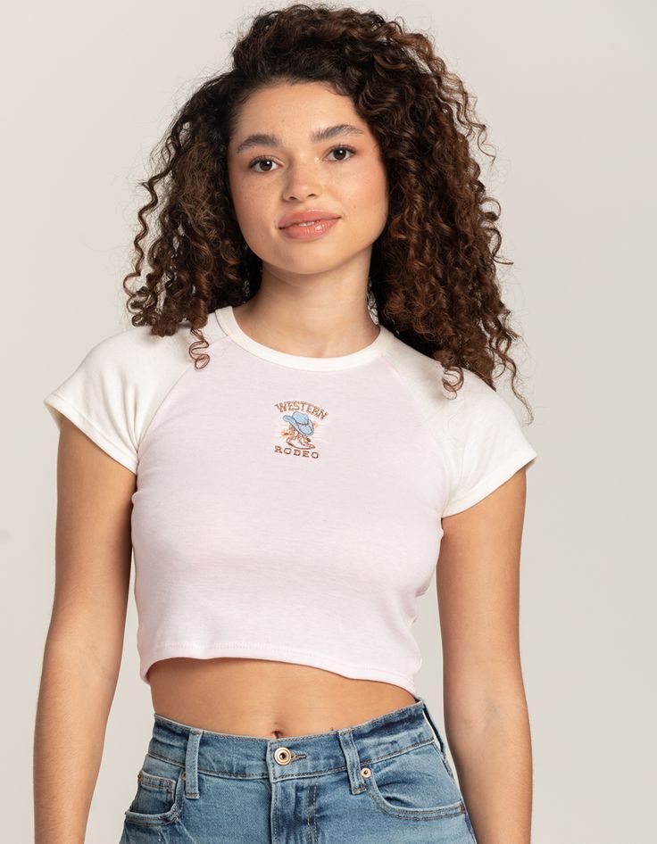 Not Eligible For Extra Discount Or Coupon Code. Full Tilt Western Boot Raglan Tee. Embroidery On Front. Crewneck. Ribbed Tee. Cropped Fit. 50% Cotton, 50% Polyester. Machine Wash. Imported. Model Is Wearing A Size Small. Model Measurements:height: 5'7" Bust: 32cwaist: 24"hips: 35" Fitted Summer Tops With Embroidered Graphics, Fitted Tops With Embroidered Graphics For Spring, Fitted Spring Tops With Embroidered Graphics, Fitted Short Sleeve Top With Embroidered Graphics, Pink Summer Tops With Embroidered Graphics, Pink Embroidered Tops For Summer, Pink Embroidered Summer Top, Embroidered Fitted T-shirt For Spring, Fitted Embroidered T-shirt For Spring