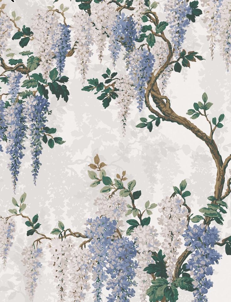 a wallpaper with blue and white flowers hanging from it's sides, in front of a tree