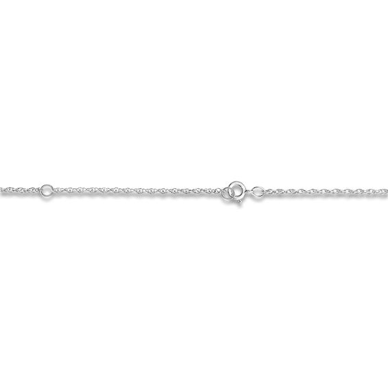 A brilliant round diamond accent embellishes a stylish, high-polish lower case letter of your choice in this vibrant women's initial bracelet. Fashioned in 14K white gold, the 7.25-inch cable chain secures in place with a lobster clasp. Classic Diamond Bracelet With Cable Chain, Fine Jewelry White Gold Cable Chain Bracelet, Silver Diamond Name Bracelet For Anniversary, White Gold Sterling Silver Bracelet With Rolo Chain, White Gold Round Rolo Chain Bracelet, Classic White Gold Rolo Chain Bracelet, White Gold Rolo Chain Bracelet, White Gold Cable Chain Bracelets, Silver Oval Link Diamond Bracelet For Anniversary