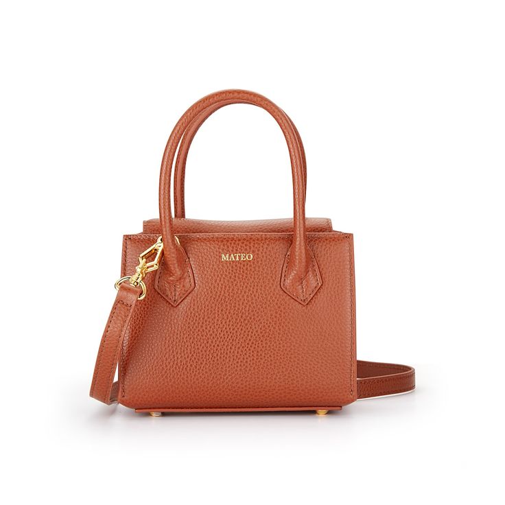 Cognac Pebbled Leather Diana Bag– MATEO Chic Cognac Textured Leather Satchel, Chic Cognac Epsom Leather Bags, Brown Smooth Grain Satchel For Evening, Chic Cognac Shoulder Bag With Smooth Grain, Cognac Textured Leather Top Handle Shoulder Bag, Cognac Textured Calf Leather Satchel, Brown Epsom Leather Satchel With Top Handle, Cognac Epsom Leather Shoulder Bag For Daily Use, Brown Epsom Leather Top Handle Satchel