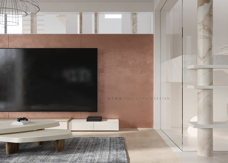 a large flat screen tv mounted to the side of a wall in a living room