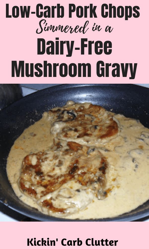 low carb pork chops simmering in dairy - free mushroom gravy