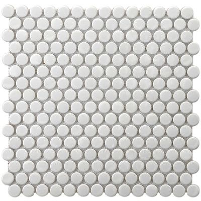 a white tile with circles on it