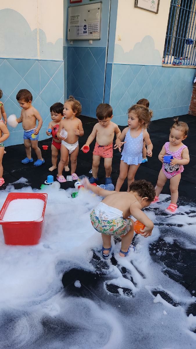 a group of babies playing in the snow