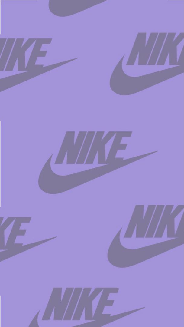 the nike logo is shown in purple and black on a light purple wallpaper background