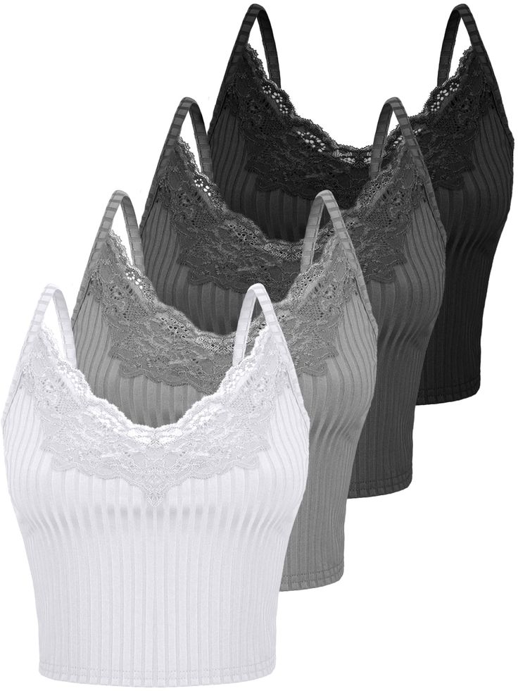 three women's bras with lace on the sides and one is black, white, and grey