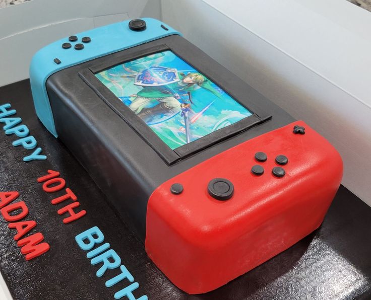 a birthday cake made to look like a video game console