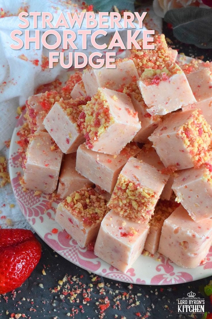 strawberry shortcake fudge on a plate with strawberries