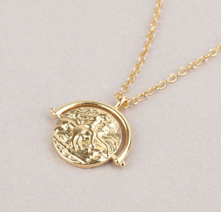 "Gorgeous gold coin necklace a must-have addition for your jewelry box. Dainty 14k goldfilled chain with gold-filled coin pendant can be worn alone or layered. ♥ Necklace length on the model is 16 inches - choose your size from 15\" - 18\" ♥ Coin measures 20 mm ♥ Our jewelry is made of 100% top quality USA components ♥ It comes in a beautiful package ready for gifting. ----------------------------------------------------------------------- ALL USA ORDERS: Shipping Transit Time Is 3-5 Business Da Gold Plated Coin Necklace For Gifting, Delicate Coin Chain Jewelry As Gift, Delicate Coin Chain Jewelry Gift, 14k Gold Coin Necklace With Clavicle Chain As Gift, Yellow Gold Coin Necklace With Clavicle Chain, Gold-plated Coin Necklace For A Gift, Delicate Coin-shaped Chain Jewelry For Gifts, Gold-tone Round Pendant Coin Necklace As Gift, Round Gold-tone Coin Necklace As Gift