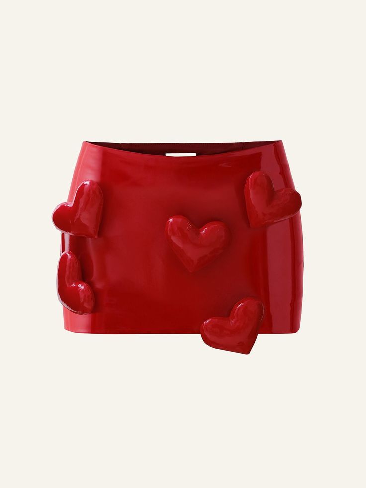 Product photo of a red patent vegan leather low rise mini skort decorated with hearts Spikes Skirt Set, Trendy Rhinestone-embellished Hats, Cheap Spring Party Platform Slippers, Cheap Chic Red Camisole, Luxury Modern Slip-on Sandals, Leather Skirt Mini Autfit, Cheap Red Elegant Coin Purse, Cheap Under Armour T-shirt For Sports, Slow Fashion Brands