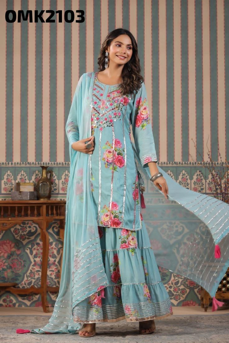 Beautiful sharara dress beautiful floral print sabyasachi design pure muslin kurti with embroidery on yoke and lots & lots of gota detailing paired with beautiful floral print pure muslin sharara and chiffon dupatta with  lots of gota detailing and tassels sizes - 38, 40, 42, 44, 46 Bollywood Style Georgette Salwar Kameez With Digital Print, Festive Digital Print Georgette Anarkali Set, Festive Georgette Anarkali Set With Digital Print, Navratri Digital Print Georgette Salwar Kameez, Navratri Georgette Salwar Kameez With Digital Print, Navratri Salwar Kameez With Digital Print In Georgette, Diwali Digital Print Georgette Dress, Festival Georgette Sharara With Digital Print, Unstitched Georgette Anarkali Set With Digital Print