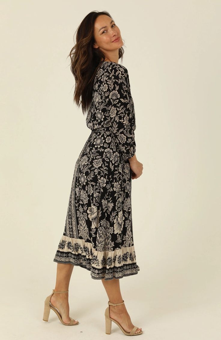 Embrace the aesthetic with our V Neck Maxi Dress with Long Sleeves. This is perfect for any work occasion. Inspired by the beauty and strength of women, our dress is not only pretty and sophisticated but also practical and versatile. Reflecting the poetic and bohemian spirit of our brand, it's a piece that is instantly wearable and can fit seamlessly into any woman's wardrobe. Enjoy the blend of vintage influence and modern style that this dress offers. Maxi Dress With Long Sleeves, V Neck Maxi Dress, Black Floral Dress, Dress With Long Sleeves, Women's Wardrobe, Printed Maxi, Floral Dress Black, Printed Maxi Dress, Xl Dress