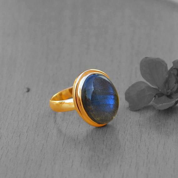 "Blue Fire Labradorite gold ring, 14k yellow gold Labradorite ring, Labradorite Cabochon jewelry,romantic gift ring,gold ring, gift for her Labradorite is known for its qualities of \"magic\" including clairvoyance, psychic powers, telepathy, communication with higher and inner wisdom and guides. Known as a gemstone of adventure, Labradorite is said to help one set off and move swiftly on the inner path and on higher journeys. The 14K yellow solid gold bezel and solid yellow gold ring are both s Gold Moonstone Cabochon Ring, Cabochon Sapphire Ring Gift, Cabochon Sapphire Ring Fine Jewelry Gift, Gold Oval Moonstone Ring For Gift, Oval Gold Moonstone Ring Gift, Gold Moonstone Cabochon Open Ring, Gold Cabochon Moonstone Open Ring, Gold Open Ring Moonstone Cabochon, Gold Open Moonstone Ring With Cabochon