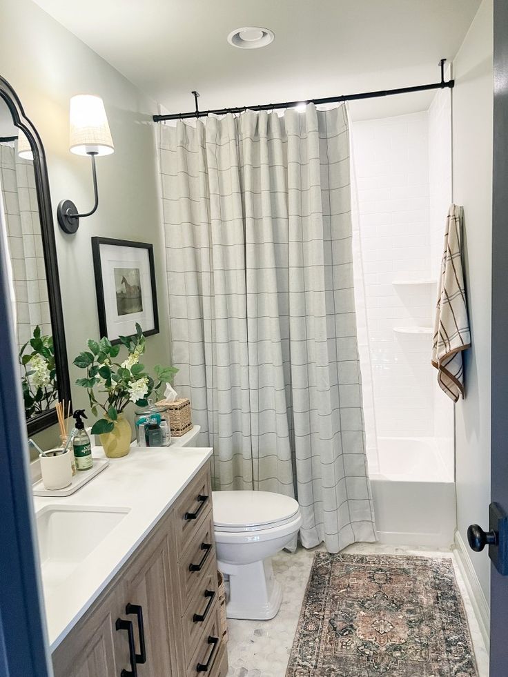 the bathroom is clean and ready to be used as a guest room or family room