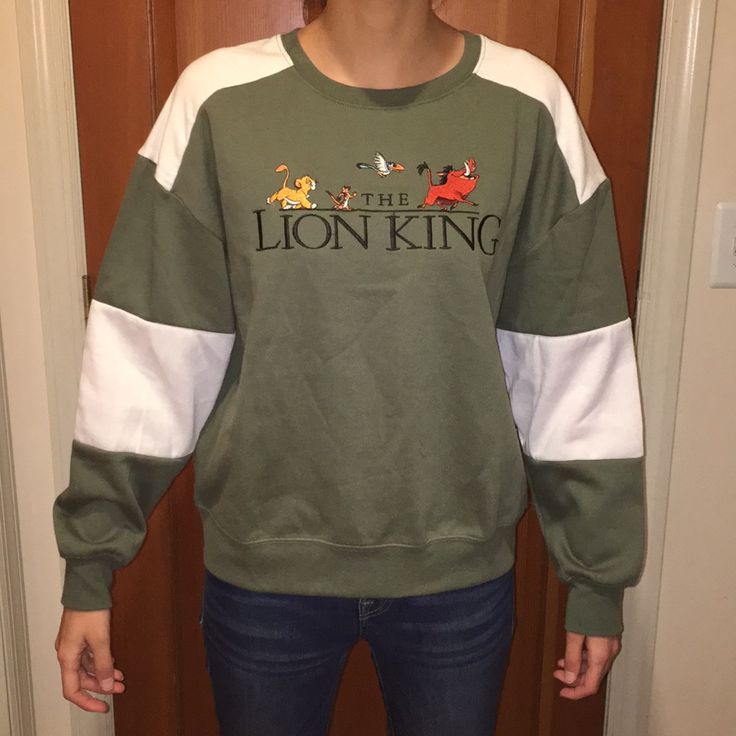 This Super Cute Lion King Shirt Is Perfect For Any Fan! It’s A Juniors Large, I Am Usually A Women’s Small And You Can See How It Fits On My In The First Pic, I’m Also 5’7. Any Questions Or If You Need More Pics Please Just Let Me Know! Casual Embroidered Tops For College, Oversized Long Sleeve Tops With Embroidered Graphics, Casual Embroidered Long Sleeve Tops, Sporty Embroidered Tops With Relaxed Fit, Trendy Long Sleeve Top With Embroidered Graphics, Embroidered Long Sleeve Tops For College, Casual Green Tops With Embroidered Graphics, Embroidered Green Tops For Streetwear, Casual Green Top With Embroidered Graphics