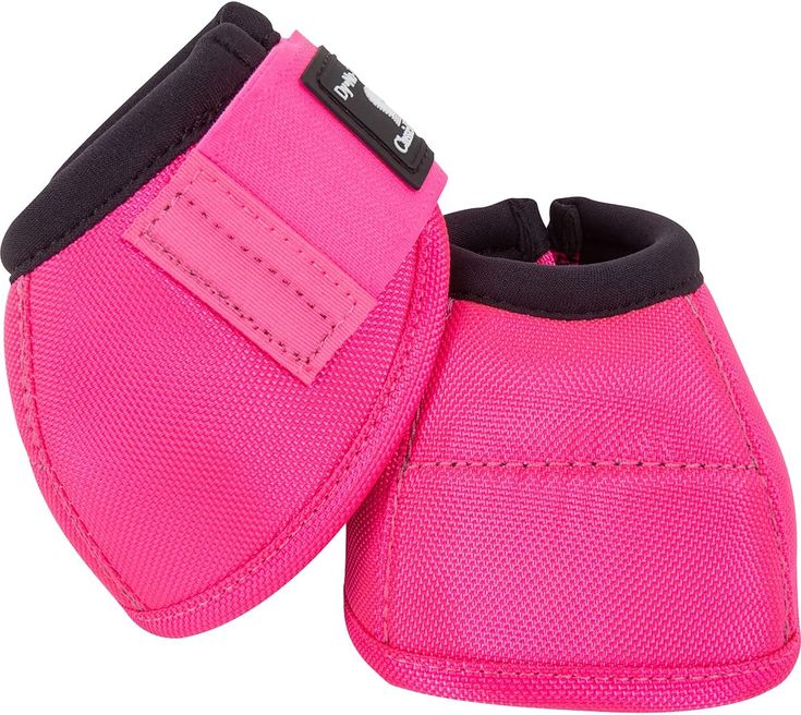 a pair of pink shoes with black straps