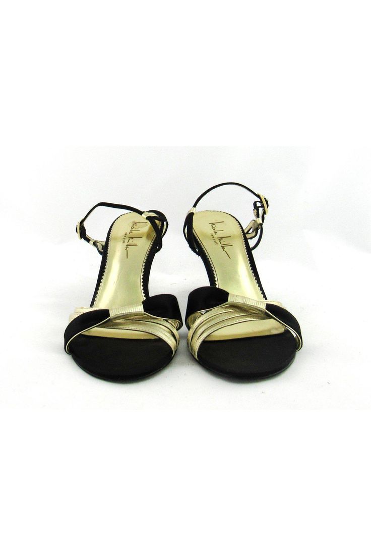 Style these strappy gold & black sandals with any evening dress. Made with a small heel, you will be able to dance the night away in these fabulous shoes. Size 7.5 B Leather & fabric upper Leather sole Gold-tone buckle Strappy style Open toe Light outsole wear Mark on interior lining Heel height 3.5"