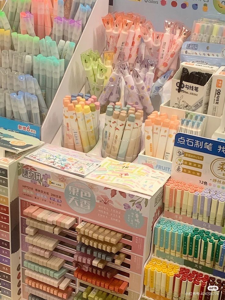 an assortment of different colored toothbrushes on display in a store