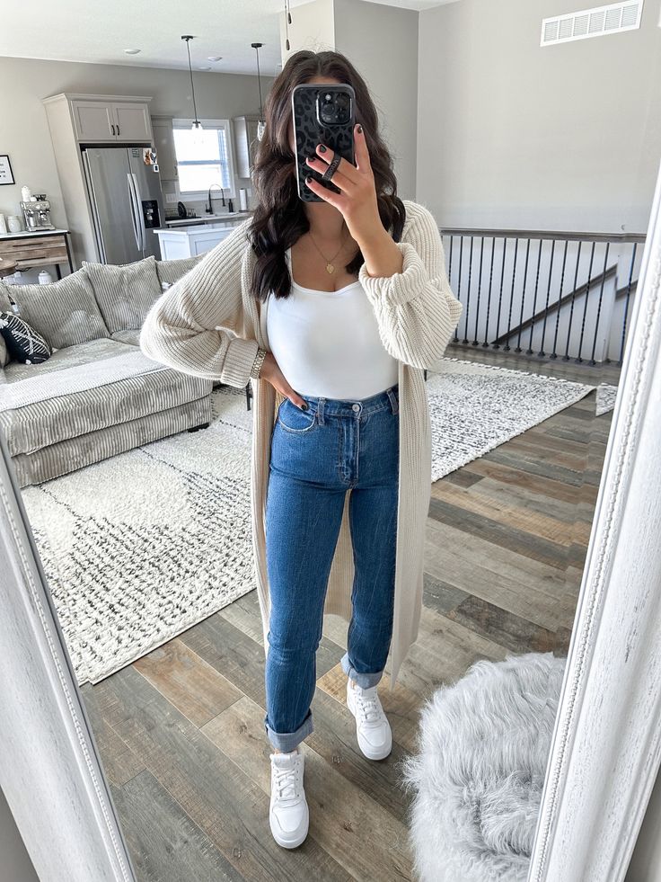 casual spring outfits for women | spring outfit for errands | duster cardigan and jeans outfit | laid-back office outfits | casual outfits for the office | dark wash high waisted denim | white nikes and jeans outfit | neutral spring outfit