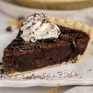 a slice of chocolate pie with whipped cream on top