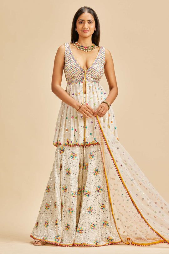 Nitika Gujral | Yellow Shaded Lehenga Set | INDIASPOPUP.COM Garara Suits Designs, Georgette Garara, Designing Clothes, Function Dresses, White Peplum Tops, White Peplum, Net Dupatta, Indian Designer Outfits, How To Make Clothes