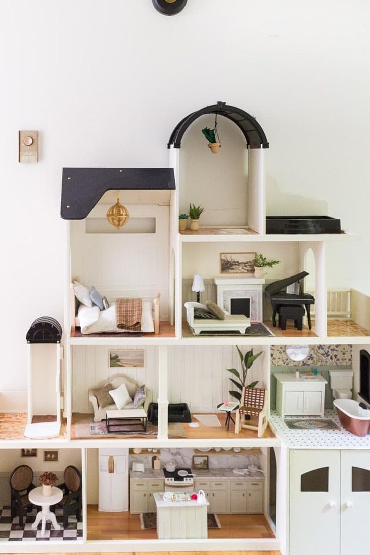 a doll house with all the furniture and accessories