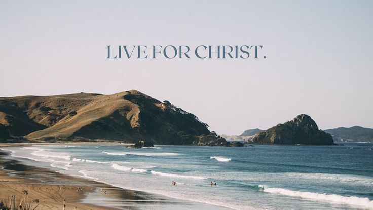 there is a quote on the beach that says live for christ