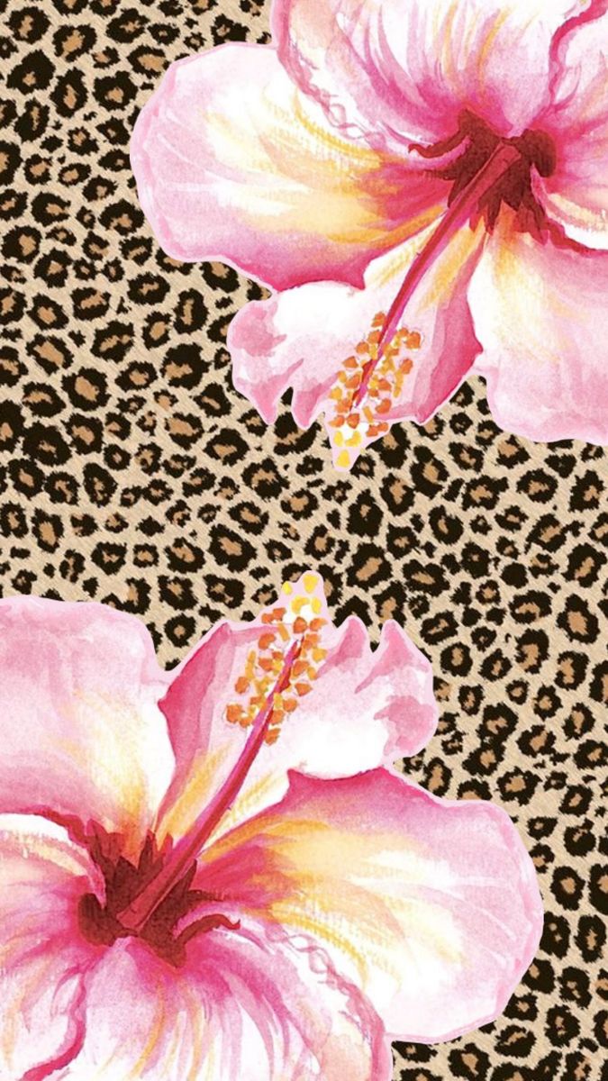 two pink flowers on a leopard print background