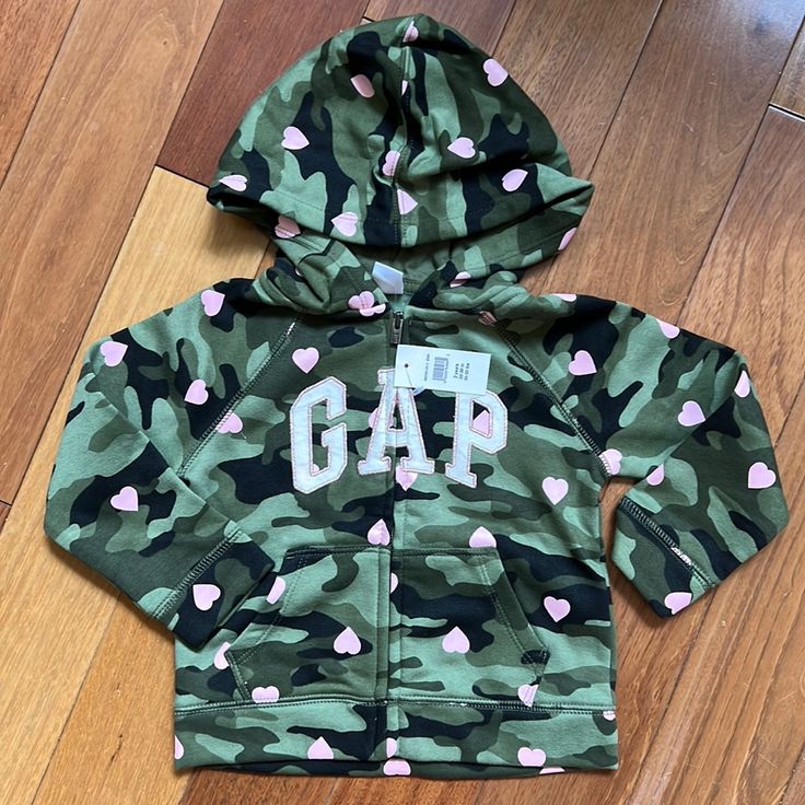 Brand New Gap Toddler Girls Camo Heart Zip Up Hoodie 2t -Front Pockets -Fleece Lining Pink Cotton Hoodie By Gap, Cute Green Hooded Top, Cute Cotton Hoodie For Playwear, Gap Pink Winter Hoodie, Gap Pink Long Sleeve Hoodie, Cotton Hoodie For Playtime, Pink Hooded Tops For Playtime, Pink Hooded Top For Playtime, Pink Casual Hoodie For Playtime