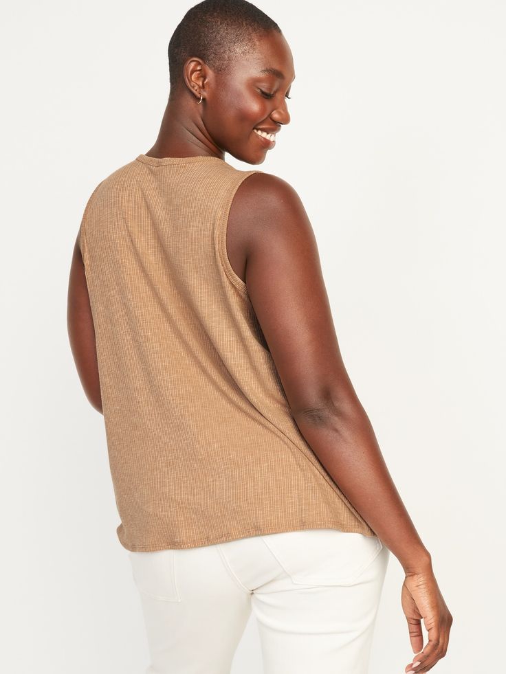 Our Luxe tank tops are supremely soft and drape beautifully.  You deserve it  Crew neck.  Sleeveless arm openings.  Rib-knit, with comfortable stretch.  Swing silhouette.  @modelsizes 5’9":S | 5'7":L | 5'10":XL @modelsizes BodEquality means size eq Casual High Neck Stretch Tank Top, Beige Crochet Tank Top, Casual Beige Vest Top, High Neck Vest Top For Spring, Beige Sleeveless Casual Tank Top, Casual Halter Neck Vest For Spring, Casual Beige Sleeveless Tank Top, Casual Halter Neck Top For Day Out, Trendy Brown Sleeveless Tank Top