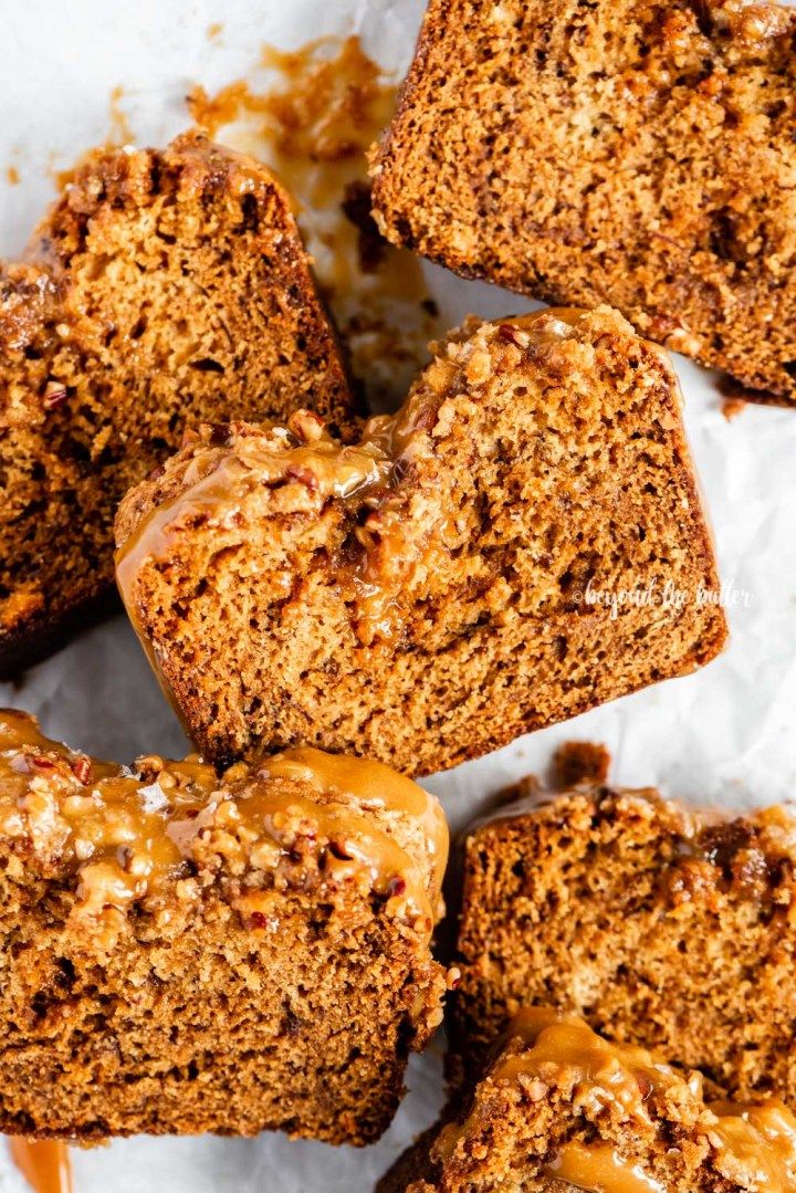 several pieces of bread with caramel drizzled on top