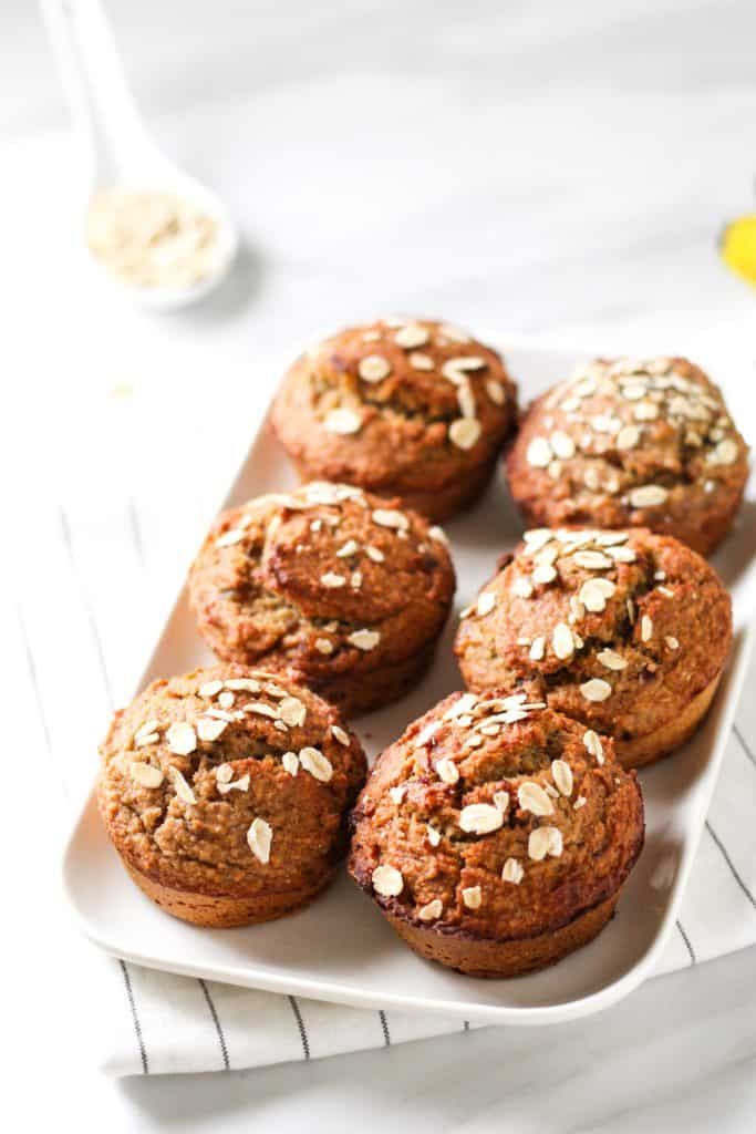 chocolate muffins with oats on a white plate