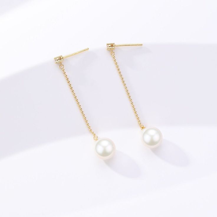 S925 Silver Natural Freshwater Pearl Long Earrings These beautiful long earrings feature AAAA natural freshwater pearls set in s925 silver with 18K gold vermeil details. Perfect for special occasions, they provide a timeless and luxurious look.Pearls size:8-9mm Elegant Gold Plated Linear Earrings For Anniversary, Elegant Gold Plated Linear Earrings, Elegant Yellow Gold Linear Earrings In Sterling Silver, Elegant Yellow Gold Sterling Silver Linear Earrings, Luxury Akoya Pearl Drop Earrings, Gold Plated Fine Jewelry Pearl Earrings For Pierced Ears, Elegant Pearl Earrings With Pearl Chain, Elegant Gold Plated Linear Earrings For Gift, Timeless 14k Gold Drop Pearl Earrings