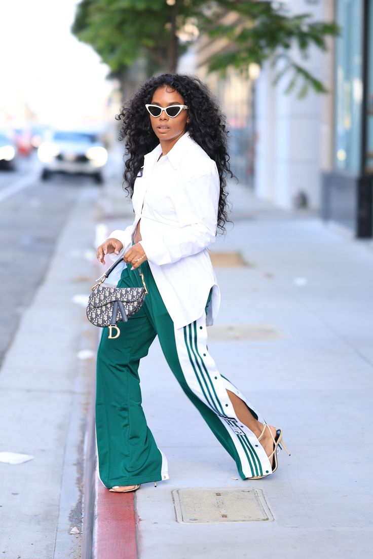 Adibreak Pants curated on LTK Formal Athletic Outfits, Smart Tracksuit Outfit, Green Sweat Suit Outfit, Track Pants And Heels Outfit, Oversized Track Pants Outfit, Blazer And Track Pants, Track Pant Outfits For Women, Adidas Snap Pants Outfit, Green Adidas Track Pants Outfit