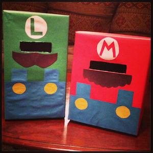 two bags made to look like mario and luigi's train are sitting on a table