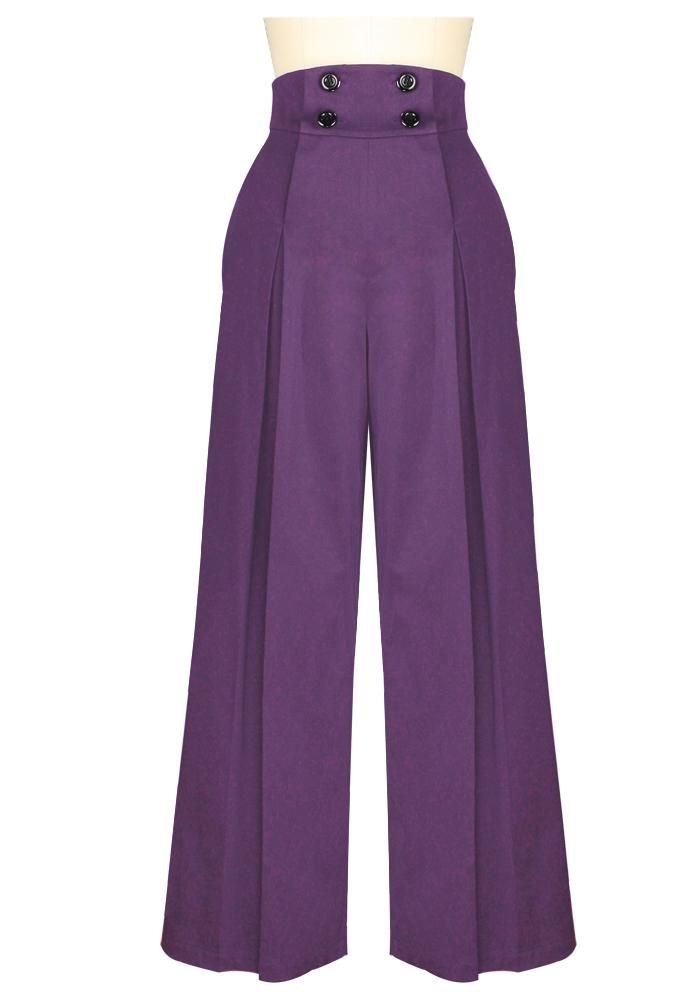 These pants are nothing short of spectacular!! They have a very high waist fastened in front with four black buttons. The retro-licious styling includes very wide legs that are pleated down the front, two functional front flap pockets, and two functional wide welt pockets in the back. You'll feel like your walking onto the set of a forties flick in these!!Fabric: 97% cotton, 3% spandexSize: XSWaist: 26-28"Hips: 36-38"Size: 3XWaist: 40-42"Hips: 50-52"Size: 5XWaist: 44-46"Hips: 54-56"Size: 6XWaist Victorian Pants, Purple Pants Outfit, Wide Leg Pleated Pants, Marlene Hose, Vintage Inspired Shoes, Retro Pants, Purple Suits, Rockabilly Outfits, Retro Jeans