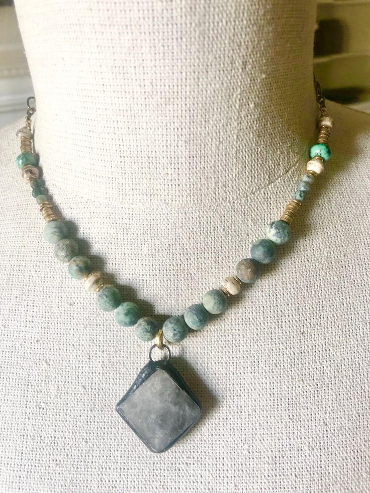 Earthy handbeaded African turquoise, Mala and heishi with a stunning handsoldered natural quartz pendant. -17” adjustable length African Turquoise, Quartz Pendant, Turquoise Pendant, Natural Turquoise, Hand Beading, Vintage Designs, Turquoise, Pendant