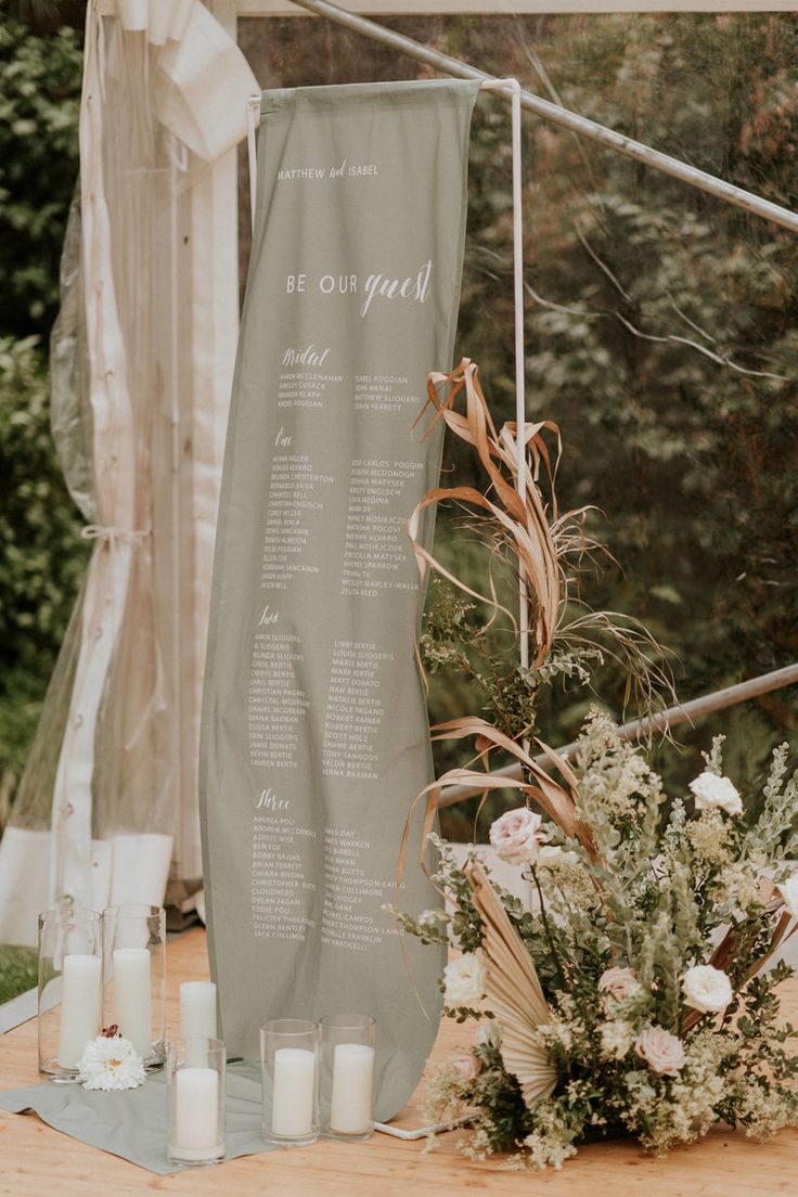 a table with candles and flowers on it