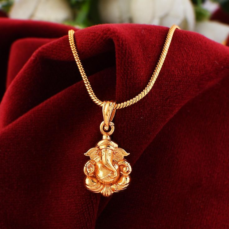 (Non- Profitable ) Antique finish Gold plated, Ganpati Fashion Pendant. This gold plated ganesh necklace are suitable for any outfit and any occasion. The package will include 1 pieces of pendant (1 pendant with gold plated rope chain) 100% Skin Friendly: All our products are lead & nickel free to ensure safety and comfort, even for sensitive skin. Kindly avoid use of water, perfume, soaps and other chemicals. For better durability, store in a plastic pouch. Wipe Jewelry with soft cloth after re Gold Chain Pendant Designs Men, Ganpati Locket Gold, Gold Locket Design For Men, Gold Pendant Designs For Women, Ganpati Pendant, Ganesh Necklace, Necklace Pendant For Men, Stylish Jewelry Accessories, Gold Pendants For Men