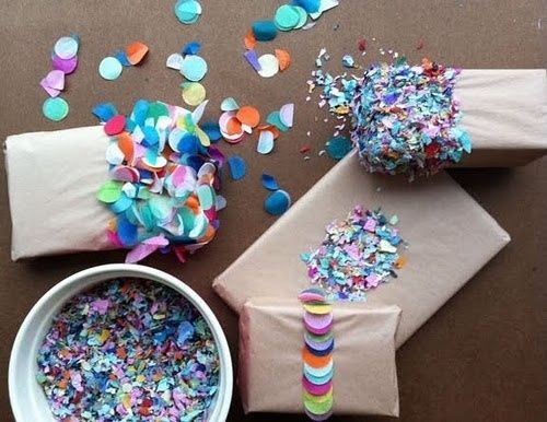 colorful confetti and sprinkles are on the table