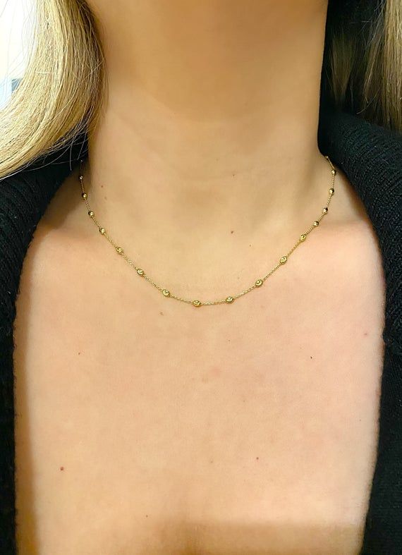 14k moon cut trendy gold chain. Material: Genuine 14k solid yellow gold.Length: Available in many lengths. If you want shorter than 16 inches leave a not at check out. Weight: Approximately 3 grams of gold. Weight depends on length chosen. Perfectly worn alone as a choker, or with a pendant as a trendy chain. Comes in nice box. Yellow Gold Necklaces With Round Beads, Gold Diamond Cut Station Necklace, Gold Round Diamond Cut Station Necklace, Yellow Gold Beaded Chain Necklace, Yellow Gold Necklaces With Satellite Chain, 14k Gold Satellite Chain Necklace, 14k Gold Round Satellite Chain Necklace, Pear Shaped Diamond Ring, Moon Cut