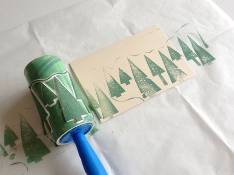 a blue toothbrush sitting on top of a piece of paper next to a roll of toilet paper