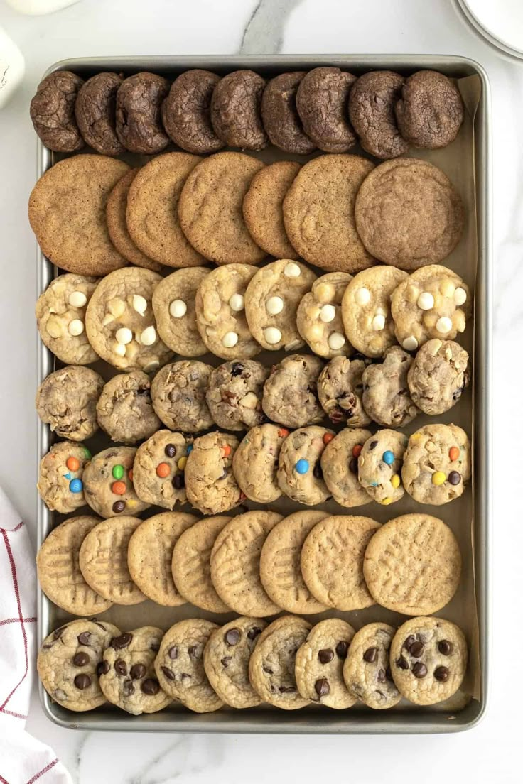 a tray filled with cookies and chocolate chip cookies