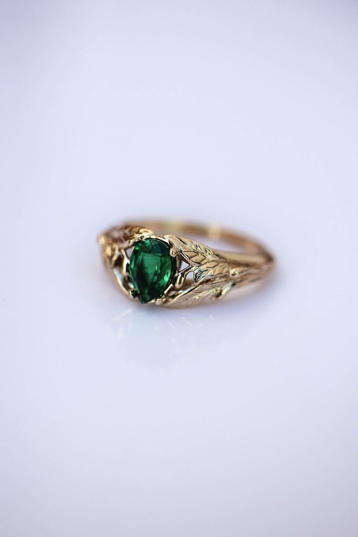 Emerald engagement ring 14K yellow gold leaves ring leaf - Etsy Brasil Green Emerald Teardrop Rings, Green Teardrop Emerald Rings, Teardrop Green Emerald Rings, Teardrop Emerald Green Rings, Green Pear-shaped 14k Gold Rings, Green Teardrop 14k Gold Ring, Teardrop Emerald Wedding Ring In 14k Gold, Gold Teardrop Emerald Promise Ring, Teardrop Green Emerald Ring For Wedding