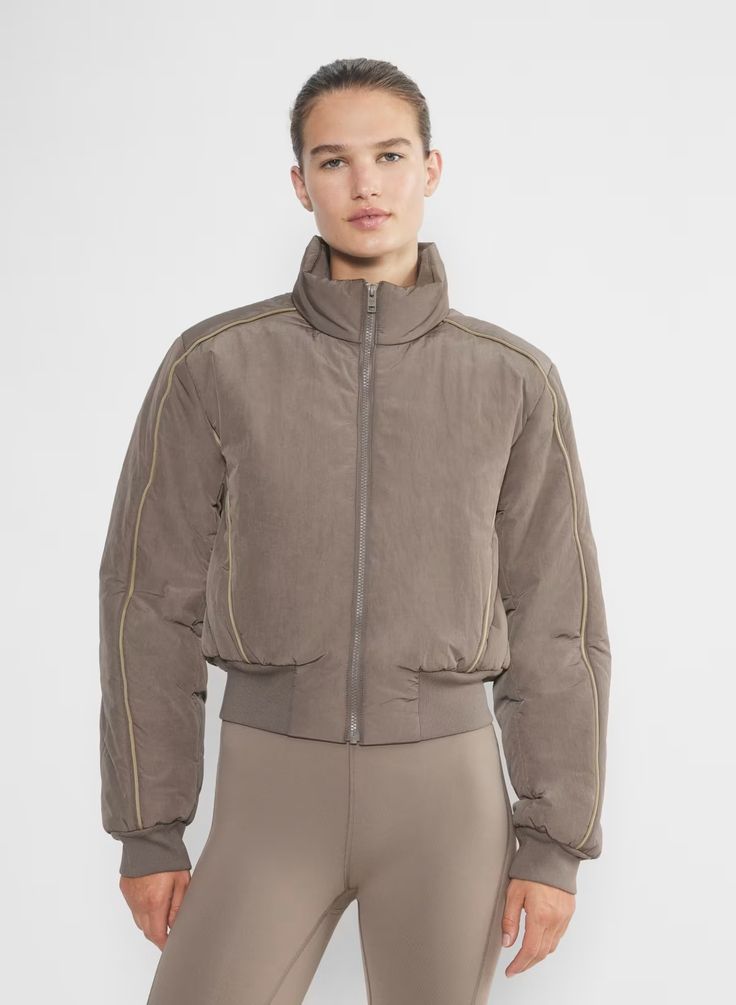 NITRO JACKET | Aritzia Sporty Down Puffer Jacket With Ribbed Cuffs, Sporty Down Puffer Outerwear, Sporty Quilted Puffer Jacket, Sporty Puffer Jacket For Cold Weather, Quilted Nylon Outerwear For Sports, Sporty Puffer Jacket With Padded Collar For Cold Weather, Winter Nylon Athleisure Track Jacket, Nylon Athleisure Outerwear For Cold Weather, Winter Nylon Track Jacket In Athleisure Style