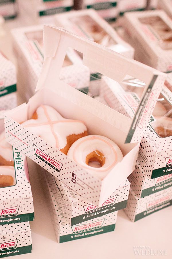 several boxes of doughnuts are stacked on top of each other